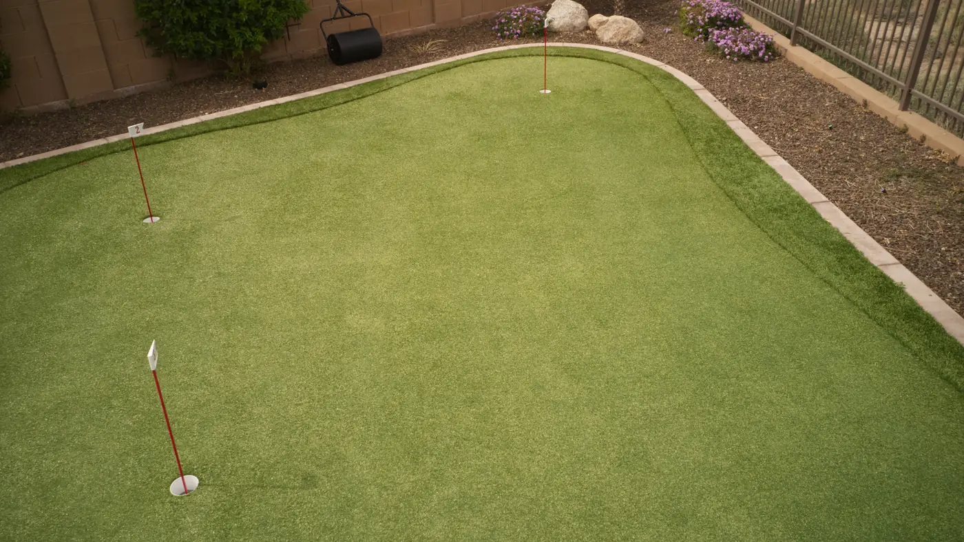 Backyard putting green Backyard synthetic putting green with flags and gravel edging installed in Castle Rock, near Parker, CO