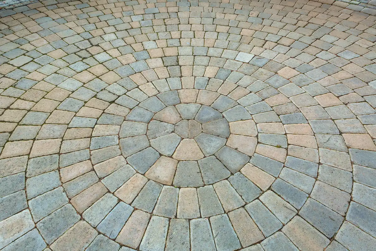 Circular paver pattern Close-up of a circular paver patio laid in a radial pattern in Parker, CO